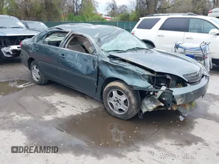 2002 Toyota Camry XLE z VIN 4T1BF32K02U522335, wystawiony jako IAAI lot #42037459 z przebiegiem 214 832 mil mil oraz . Historia ofert i sprzedaży dostępna na DreamBid. Obrazek 1.