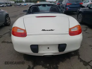 2001 Porsche Boxster z VIN WP0CA29821U622592, wystawiony jako Copart lot #56050735 z przebiegiem Nie podano mil oraz Szkoda całkowita • Salvage title. Historia ofert i sprzedaży dostępna na DreamBid. Obrazek 6.