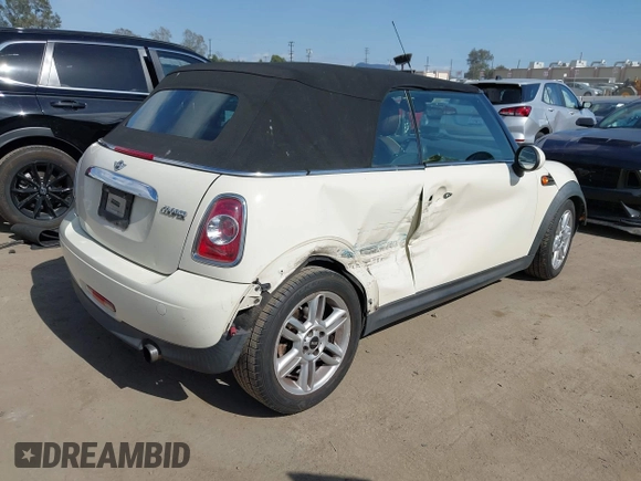 2012 MINI Convertible z VIN WMWZN3C53CT134194, wystawiony jako IAAI lot #42261686 z przebiegiem 104 099 mil mil oraz . Historia ofert i sprzedaży dostępna na DreamBid. Obrazek 4.