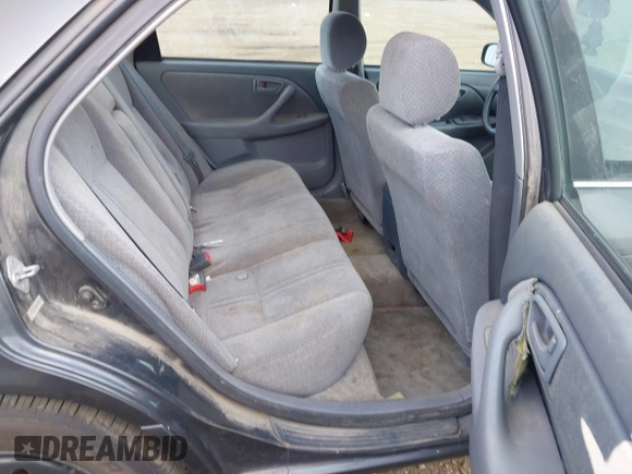 2000 Toyota Camry LE z VIN JT2BF22K4Y0236656, wystawiony jako IAAI lot #42476539 z przebiegiem 210 773 mil mil oraz . Historia ofert i sprzedaży dostępna na DreamBid. Obrazek 8.