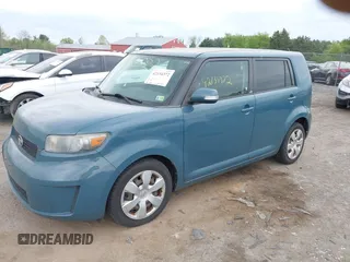 2008 Scion xB with VIN JTLKE50EX81005753, listed as a IAAI auction lot 42134372 with 180,218 mi miles. Bid and sale history available at carsss.com. Image 2.