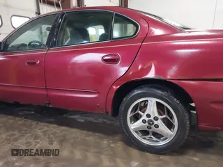 2004 Pontiac Grand Am SE with VIN 1G2NE52F94C247452, listed as a IAAI auction lot 41480289 with 154,690 mi miles. Bid and sale history available at carsss.com. Image 6.