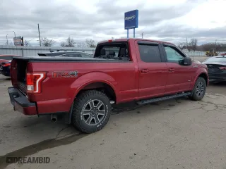2015 Ford F-150 XLT w/HD Payload Pkg with VIN 1FTFW1EG9FFA35744, listed as a Copart auction lot 51133275 with 128,006 mi miles and Salvage Title. Bid and sale history available at carsss.com. Image 3.