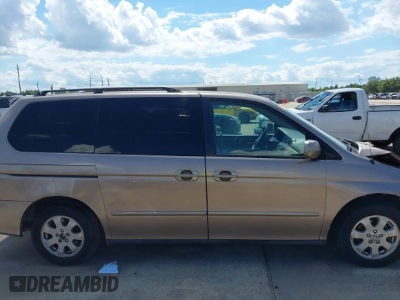 2003 Honda Odyssey EX-L z VIN 5FNRL18993B116892, wystawiony jako IAAI lot #42241908 z przebiegiem 276 223 mil mil oraz . Historia ofert i sprzedaży dostępna na DreamBid. Obrazek 14.
