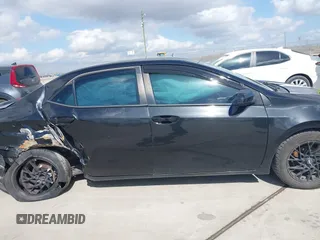 2015 Toyota Corolla L with VIN 5YFBURHE3FP307047, listed as a IAAI auction lot 41525250 with 181,605 mi miles and . Bid and sale history available at DreamBid. Image 13.