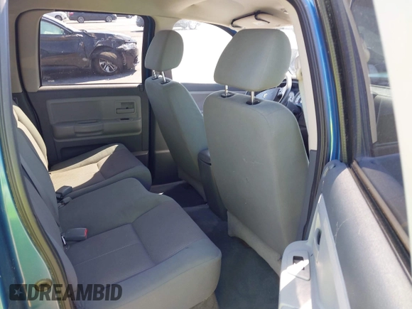2005 Dodge Dakota SLT with VIN 1D7HW48N05S319621, listed as a IAAI auction lot 42037140 with 251,595 mi miles and . Bid and sale history available at DreamBid. Image 8.
