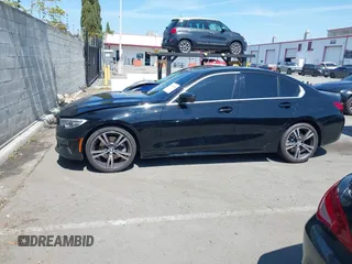 2021 BMW 3 Series 330i z VIN 3MW5R1J02M8B67582, wystawiony jako IAAI lot #41880589 z przebiegiem 31 915 mil mil oraz . Historia ofert i sprzedaży dostępna na DreamBid. Obrazek 14.