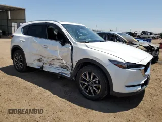 2018 Mazda CX-5 Grand Touring z VIN JM3KFBDM1J0473754, wystawiony jako Copart lot #60362245 z przebiegiem 72 792 mil mil oraz Szkoda całkowita • Salvage title. Historia ofert i sprzedaży dostępna na DreamBid. Obrazek 4.