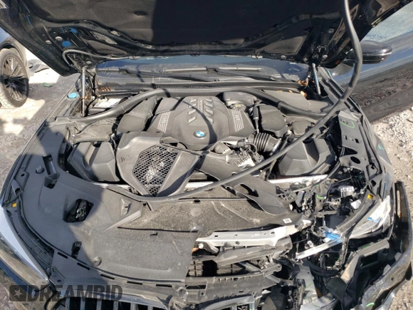 2022 BMW 8 Series M850i xDrive z VIN WBABC4C01NCJ64525, wystawiony jako Copart lot #83996594 z przebiegiem Nie podano mil oraz Szkoda całkowita • Salvage title. Historia ofert i sprzedaży dostępna na DreamBid. Obrazek 11.
