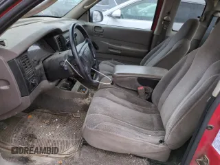 2001 Dodge Dakota z VIN 1B7GL22X41S256594, wystawiony jako Copart lot #43012935 z przebiegiem 217 179 mil mil oraz Szkoda całkowita • Salvage title. Historia ofert i sprzedaży dostępna na DreamBid. Obrazek 7.