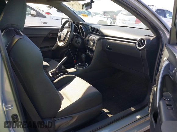 2015 Scion tC with VIN JTKJF5C7XFJ012872, listed as a IAAI auction lot 42128621 with 100,832 mi miles. Bid and sale history available at carsss.com. Image 5.