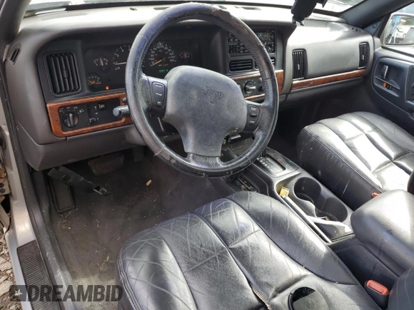 1998 Jeep Grand Cherokee Limited с VIN 1J4GZ78Y0WC245194, выставлен на аукционе Copart как лот 57838825 с пробегом 199 412 миль миль и Списание • Salvage title. История ставок и продаж доступна на DreamBid. Изображение 8.