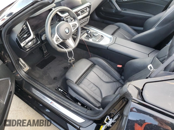 2020 BMW Z4 sDriveM40i z VIN WBAHF9C08LWW33054, wystawiony jako Copart lot #73803034 z przebiegiem Nie podano mil oraz Nie do naprawy. Historia ofert i sprzedaży dostępna na DreamBid. Obrazek 7.