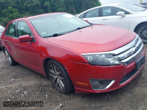 2012 Ford Fusion SEL z VIN 3FAHP0JAXCR221377, wystawiony jako IAAI lot #42664205 z przebiegiem 213 881 mil mil oraz . Historia ofert i sprzedaży dostępna na DreamBid. Obrazek 1.