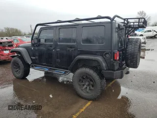 2008 Jeep Wrangler Unlimited Rubicon with VIN 1J4GA69188L642528, listed as a Copart auction lot 50103815 with 165,703 mi miles and Salvage Title. Bid and sale history available at carsss.com. Image 2.