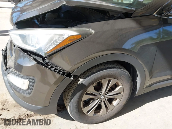 2014 Hyundai Santa Fe z VIN 5XYZUDLB0EG187192, wystawiony jako IAAI lot #42360255 z przebiegiem 154 607 mil mil oraz . Historia ofert i sprzedaży dostępna na DreamBid. Obrazek 6.