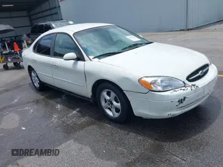 2003 Ford Taurus SE Standard z VIN 1FAFP53U13A192387, wystawiony jako IAAI lot #42398723 z przebiegiem 247 077 mil mil oraz . Historia ofert i sprzedaży dostępna na DreamBid. Obrazek 1.