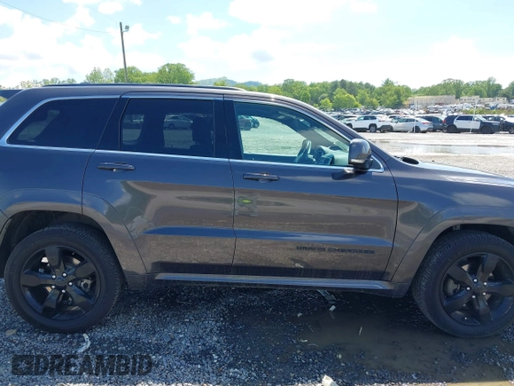 2016 Jeep Grand Cherokee Overland with VIN 1C4RJFCG6GC417485, listed as a IAAI auction lot 42210973 with 115,612 mi miles and . Bid and sale history available at DreamBid. Image 13.