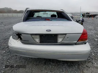1999 Ford Crown Victoria Police with VIN 2FAFP71W8XX237354, listed as a Copart auction lot 79340304 with 198,482 mi miles and Salvage Title. Bid and sale history available at carsss.com. Image 6.