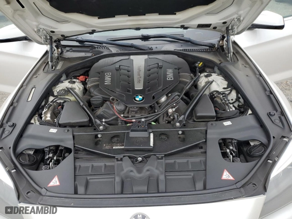 2015 BMW 6 Series 650i with VIN WBA6B2C57FGB99135, listed as a Copart auction lot 72610904 with 99,137 mi miles and Salvage Title. Bid and sale history available at carsss.com. Image 12.
