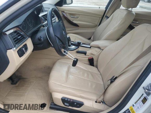 2013 BMW 3 Series 320i xDrive with VIN WBA3C3C57DF980971, listed as a Copart auction lot 57441155 with 131,263 mi miles and Salvage title. Bid and sale history available at DreamBid. Image 7.