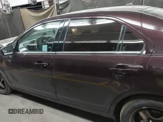 2011 Ford Fusion SE with VIN 3FAHP0HA3BR345933, listed as a IAAI auction lot 42008980 with 147,076 mi miles. Bid and sale history available at carsss.com. Image 14.