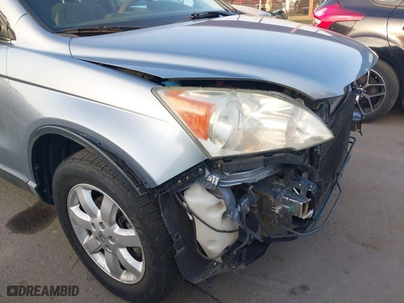 2008 Honda CR-V EX with VIN 3CZRE38568G706370, listed as a IAAI auction lot 41031674 with 124,494 mi miles. Bid and sale history available at carsss.com. Image 14.