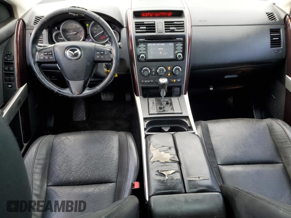 2015 Mazda CX-9 Grand Touring z VIN JM3TB2DA8F0457807, wystawiony jako Copart lot #61803555 z przebiegiem 110 104 mil mil oraz Czysty tytuł • Clean title. Historia ofert i sprzedaży dostępna na DreamBid. Obrazek 8.