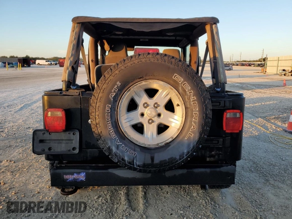 2006 Jeep Wrangler Unlimited LWB with VIN 1J4FA44S76P704295, listed as a Copart auction lot 83758494 with 168,631 mi miles and Salvage Title. Bid and sale history available at carsss.com. Image 6.