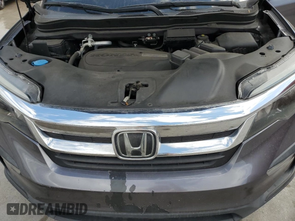 2019 Honda Pilot LX with VIN 5FNYF5H14KB035513, listed as a Copart auction lot 45879025 with 70,124 mi miles and Salvage Title. Bid and sale history available at DreamBid. Image 14.
