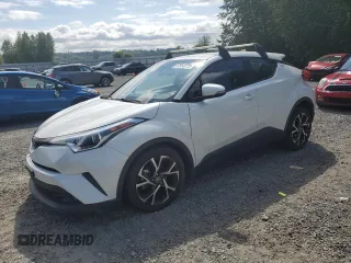 2018 Toyota C-HR XLE with VIN NMTKHMBX9JR060424, listed as a Copart auction lot 57913775 with 104,847 mi miles and Salvage title. Bid and sale history available at DreamBid. Image 1.