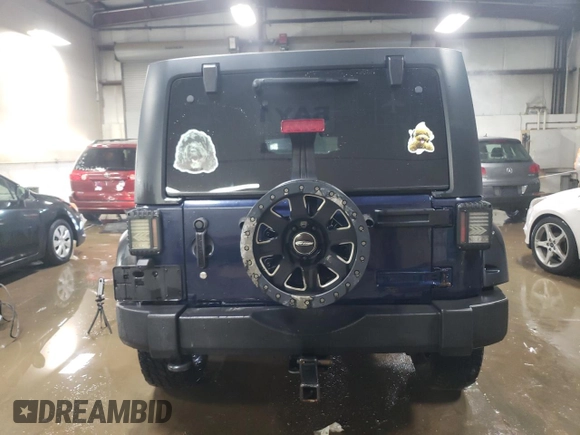 2013 Jeep Wrangler Unlimited Sport z VIN 1C4BJWDG5DL529707, wystawiony jako Copart lot #48436325 z przebiegiem 142 661 mil mil oraz Szkoda całkowita • Salvage title. Historia ofert i sprzedaży dostępna na DreamBid. Obrazek 6.