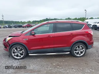 2013 Ford Escape Titanium with VIN 1FMCU9J94DUC07522, listed as a IAAI auction lot 42365124 with 61,168 mi miles and . Bid and sale history available at DreamBid. Image 14.