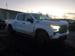 2023 Chevrolet Silverado 1500 LT Trail Boss with VIN 3GCUDFE88PG190420, listed as a Copart auction lot 87728935 with 54,396 mi miles and Salvage Title. Bid and sale history available at DreamBid. Image 4.