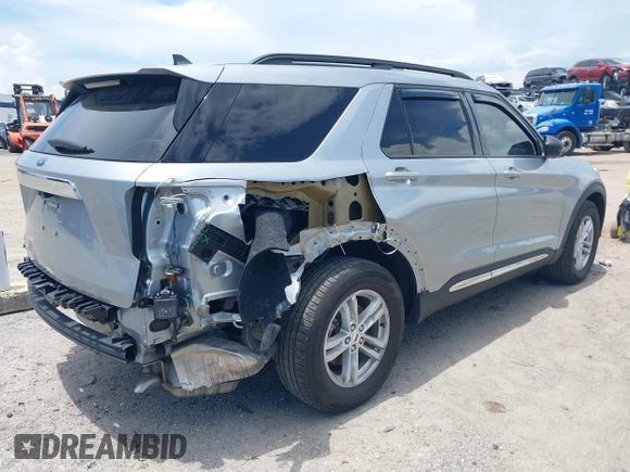 2023 Ford Explorer XLT with VIN 1FMSK7DH5PGB69004, listed as a IAAI auction lot 42517662 with 18,299 mi miles and . Bid and sale history available at DreamBid. Image 4.
