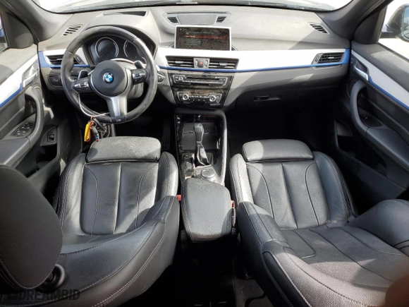 2018 BMW X1 sDrive28i with VIN WBXHU7C3XJ5L06006, listed as a Copart auction lot 47666595 with 56,142 mi miles and Salvage Title. Bid and sale history available at carsss.com. Image 8.