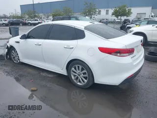 2016 Kia Optima LX with VIN 5XXGT4L30GG049534, listed as a IAAI auction lot 41770579 with 94,257 mi miles. Bid and sale history available at carsss.com. Image 3.