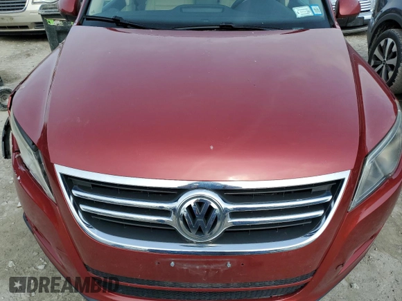 2011 Volkswagen Tiguan SE with VIN WVGBV7AX7BW001124, listed as a Copart auction lot 53044005 with 150,072 mi miles and Salvage Title. Bid and sale history available at DreamBid. Image 12.