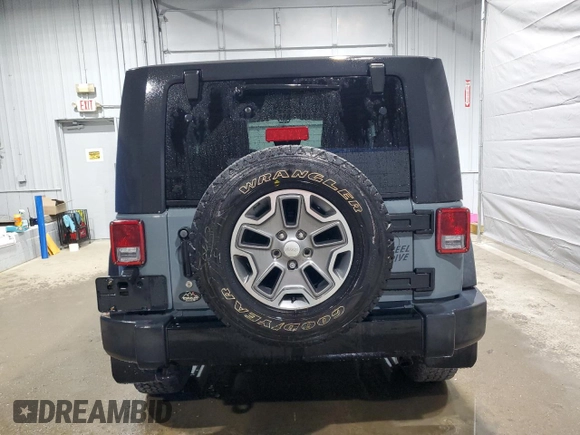2014 Jeep Wrangler Sport with VIN 1C4AJWAG9EL322982, listed as a Copart auction lot 51145075 with 122,686 mi miles and Salvage Title. Bid and sale history available at DreamBid. Image 6.