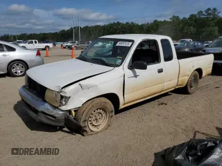 1999 Toyota Tacoma z VIN 4TAVL52N3XZ457101, wystawiony jako Copart lot #56697415 z przebiegiem 381 075 mil mil oraz Szkoda całkowita • Salvage title. Historia ofert i sprzedaży dostępna na DreamBid. Obrazek 1.