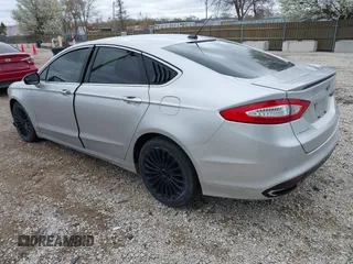 2014 Ford Fusion Titanium with VIN 3FA6P0K92ER367576, listed as a IAAI auction lot 42062207 with 171,351 mi miles. Bid and sale history available at carsss.com. Image 3.