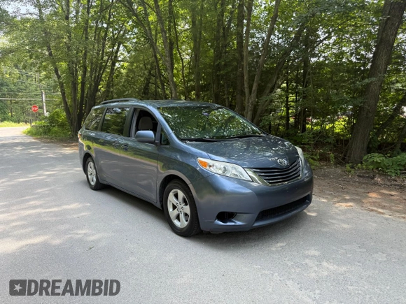 2015 Toyota Sienna LE AAS with VIN 5TDKK3DC1FS623710, listed as a Copart auction lot 62335575 with 221,148 mi miles and Clean title. Bid and sale history available at DreamBid. Image 1.
