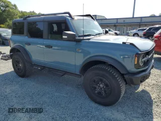2023 Ford Bronco with VIN 1FMEE5DP7PLB67908, listed as a Copart auction lot 61641545 with 10,256 mi miles and Salvage title. Bid and sale history available at DreamBid. Image 4.