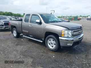 2012 Chevrolet Silverado 1500 LT with VIN 1GCRKSE77CZ197333, listed as a IAAI auction lot 42081096 with 104,928 mi miles and . Bid and sale history available at DreamBid. Image 1.
