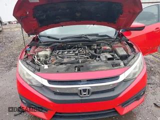 2016 Honda Civic EX-L with VIN 2HGFC1F7XGH656001, listed as a IAAI auction lot 42412343 with 227,271 mi miles and . Bid and sale history available at DreamBid. Image 10.