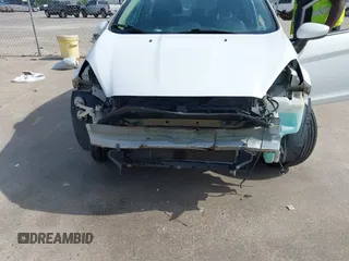 2017 Ford Fiesta SE z VIN 3FADP4BJ1HM126375, wystawiony jako IAAI lot #42244318 z przebiegiem 70 829 mil mil oraz . Historia ofert i sprzedaży dostępna na DreamBid. Obrazek 6.
