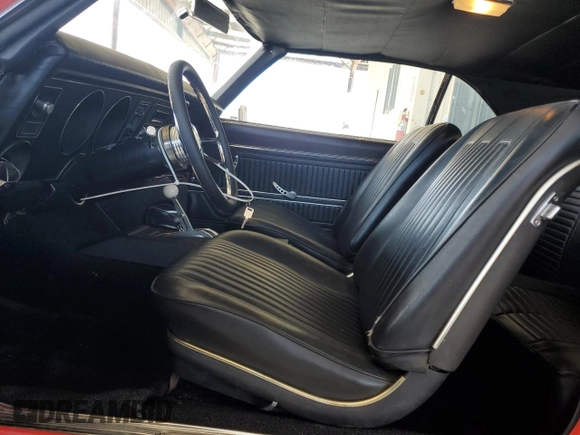 1969 Pontiac Firebird z VIN 223379ULL6573, wystawiony jako Copart lot #57812295 z przebiegiem 142 mil mil oraz Tytuł czysty. Historia ofert i sprzedaży dostępna na DreamBid. Obrazek 7.