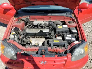 2005 Hyundai Accent GLS with VIN KMHCG45C15U592443, listed as a Copart auction lot 52291025 with 142,263 mi miles and Salvage Title. Bid and sale history available at carsss.com. Image 12.