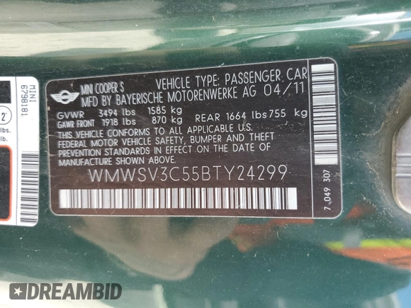2011 MINI Hardtop S with VIN WMWSV3C55BTY24299, listed as a Copart auction lot 54725755 with 82,489 mi miles and Salvage Title. Bid and sale history available at DreamBid. Image 12.