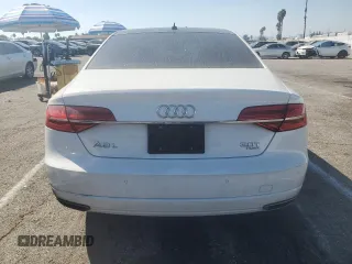 2018 Audi A8 z VIN WAU44AFD5JN000311, wystawiony jako Copart lot #72820344 z przebiegiem 70 140 mil mil oraz Szkoda całkowita • Salvage title. Historia ofert i sprzedaży dostępna na DreamBid. Obrazek 6.
